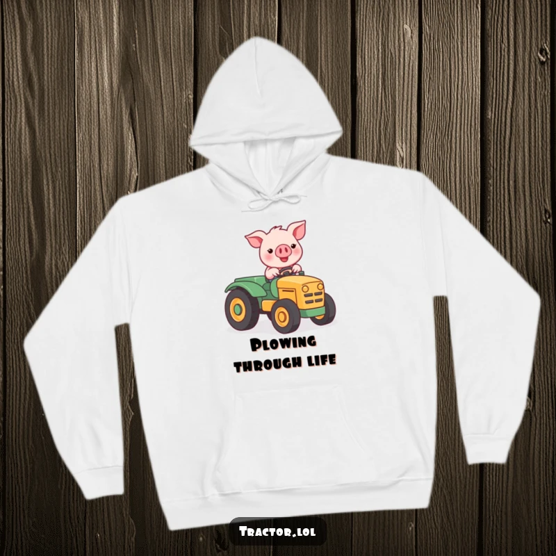Funny Kawaii pig character driving a miniature tractor, perfect for a cozy, humorous hoodie.